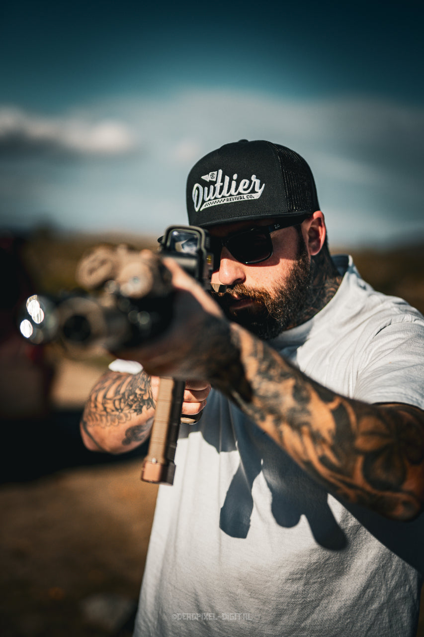 "Outliers" Trucker Hat